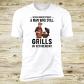 Never Underestimate A Man Who Still Grills In Retirement | Deluxe Tee